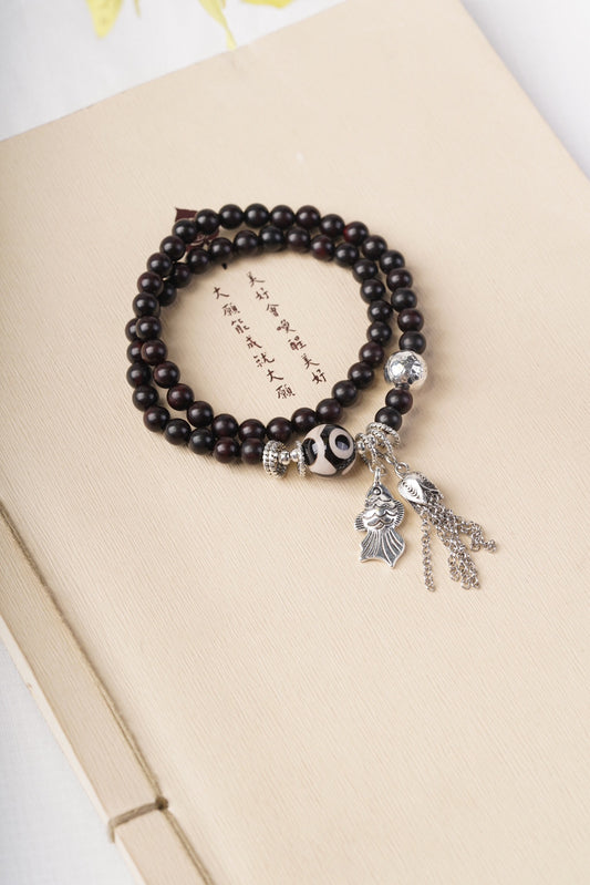 Mystic Blessings Bracelet Rosewood · Sterling Silver · Tibetan Dzi Bead